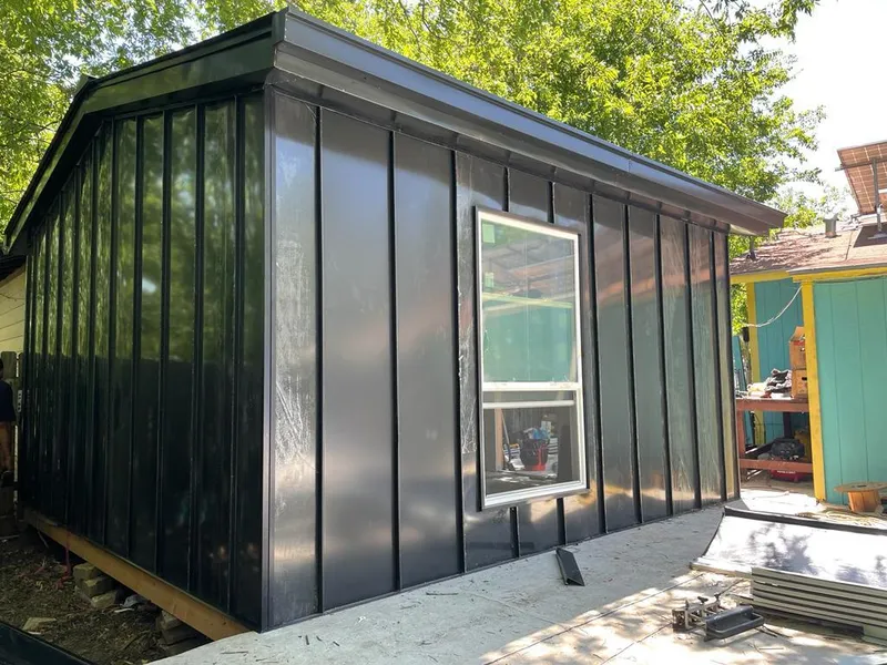 Black standing seam metal wall panels for Roof Inspection in Santa Clarita